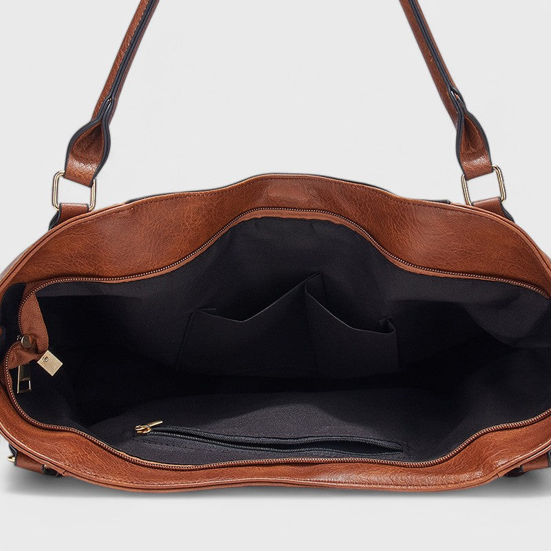 Nora. - Elegante Tasche mit Quaste