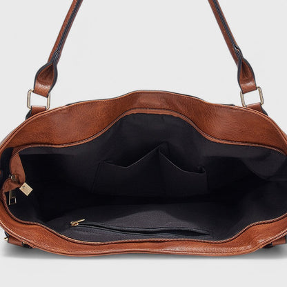 Nora. - Elegante Tasche mit Quaste