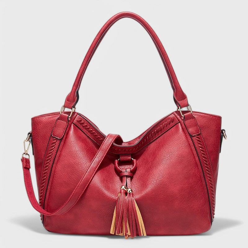 Nora. - Elegante Tasche mit Quaste