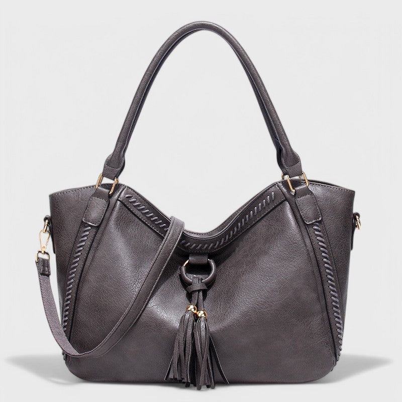 Nora. - Elegante Tasche mit Quaste